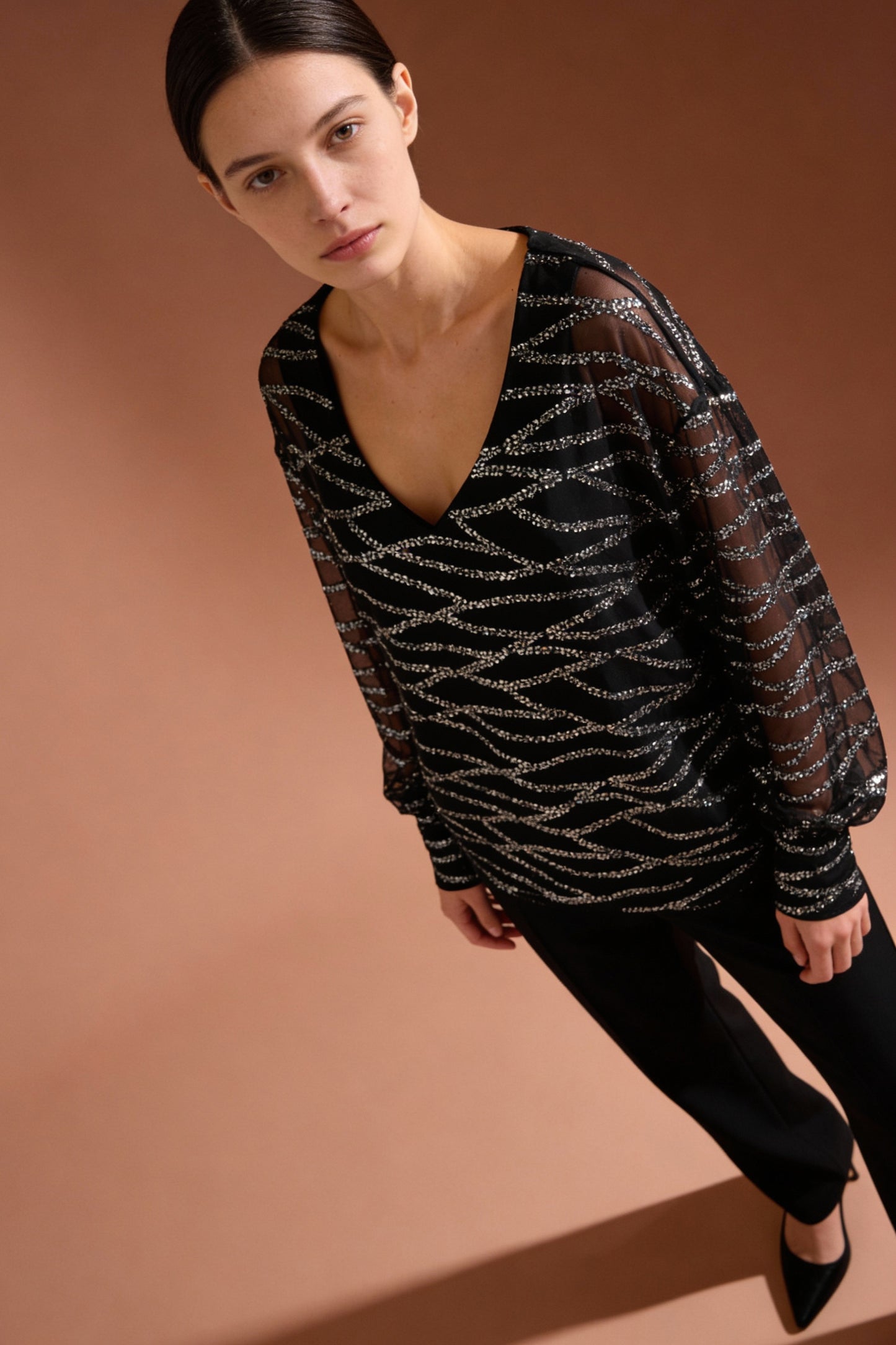 Blusa con paillettes