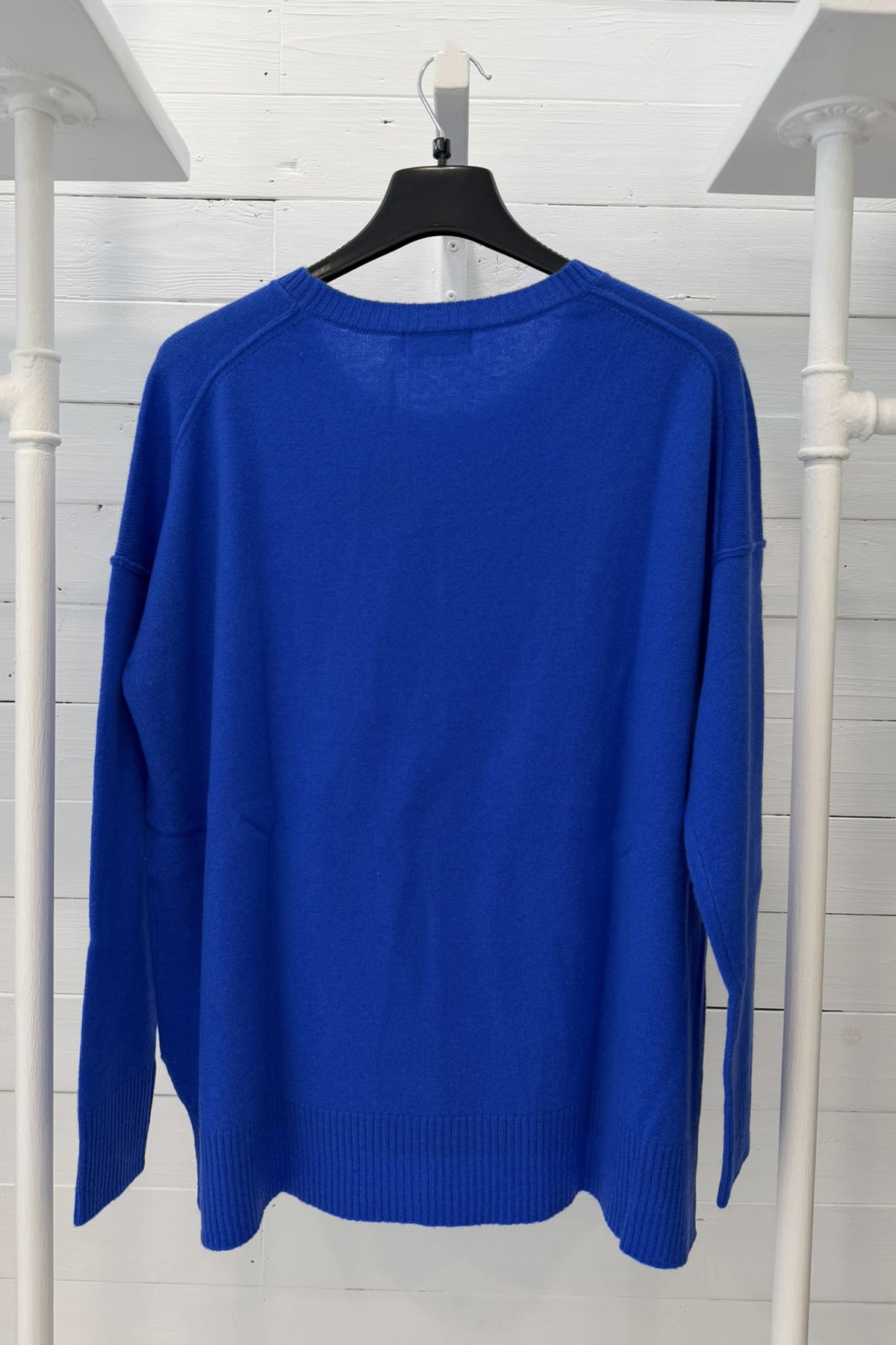 Maglia in puro cashmere con fondo asimmetrico