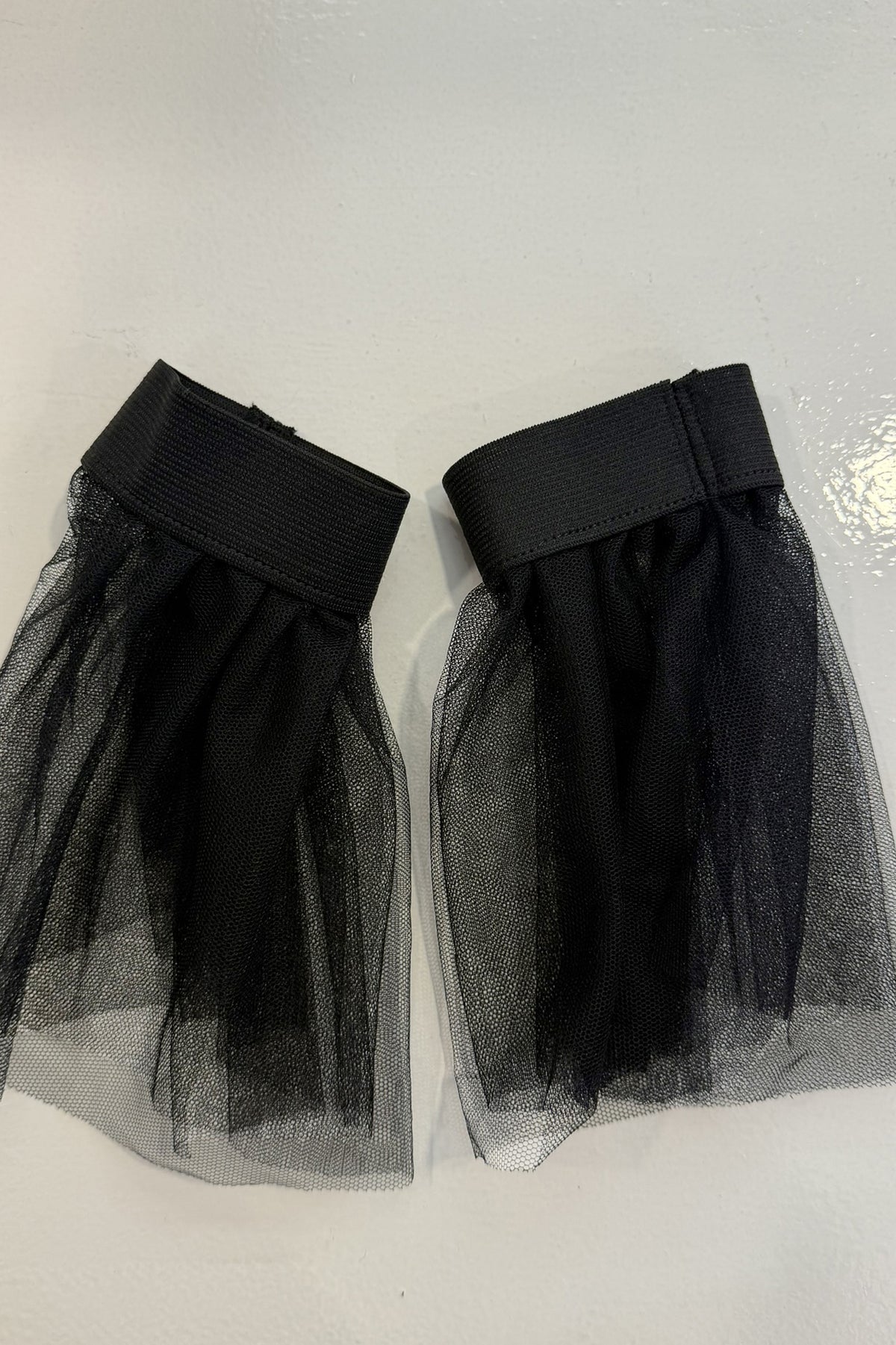 Blazer asimmetrico con ruches e manicotti in tulle