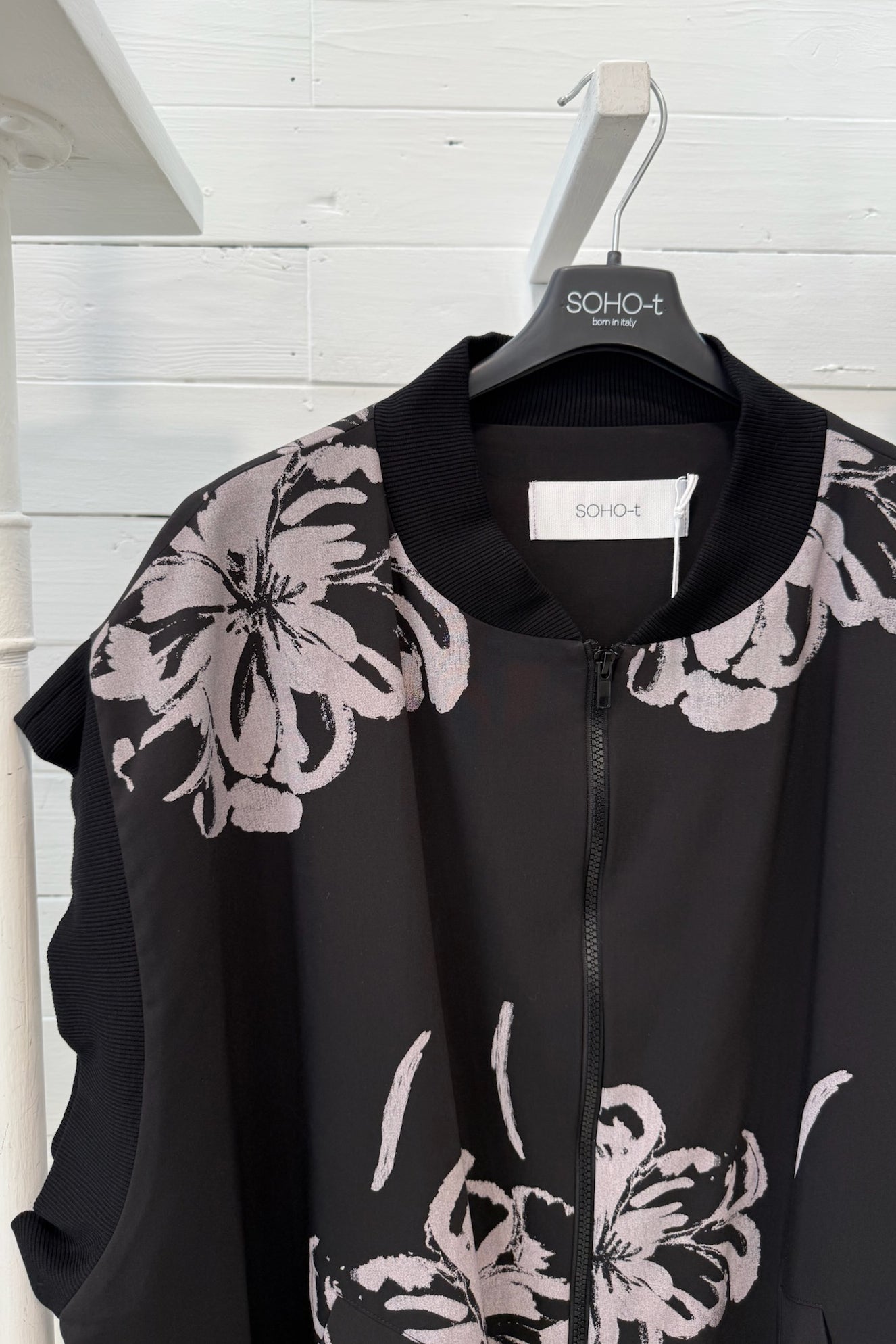 Bomber smanicato con motivo floreale