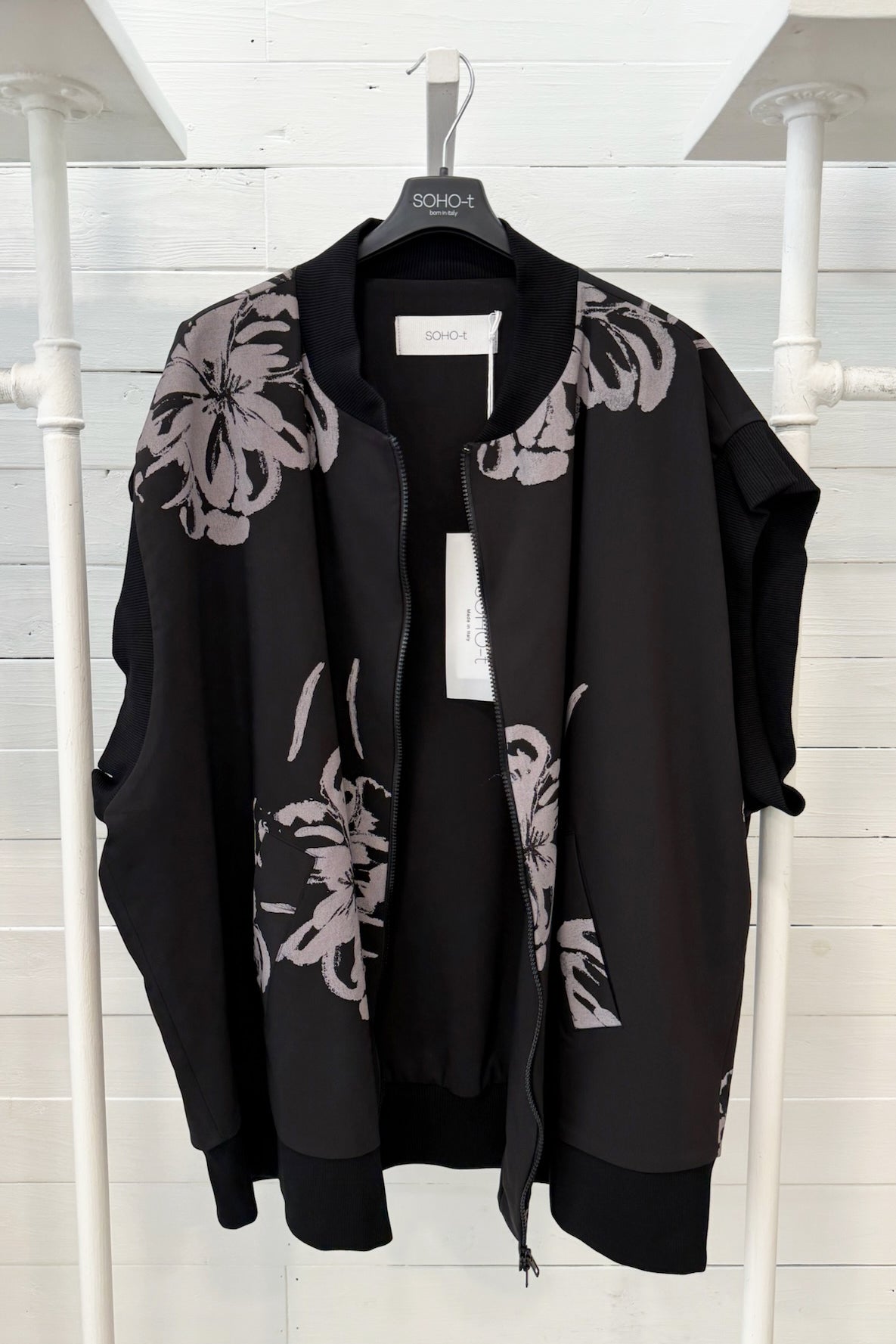 Bomber smanicato con motivo floreale