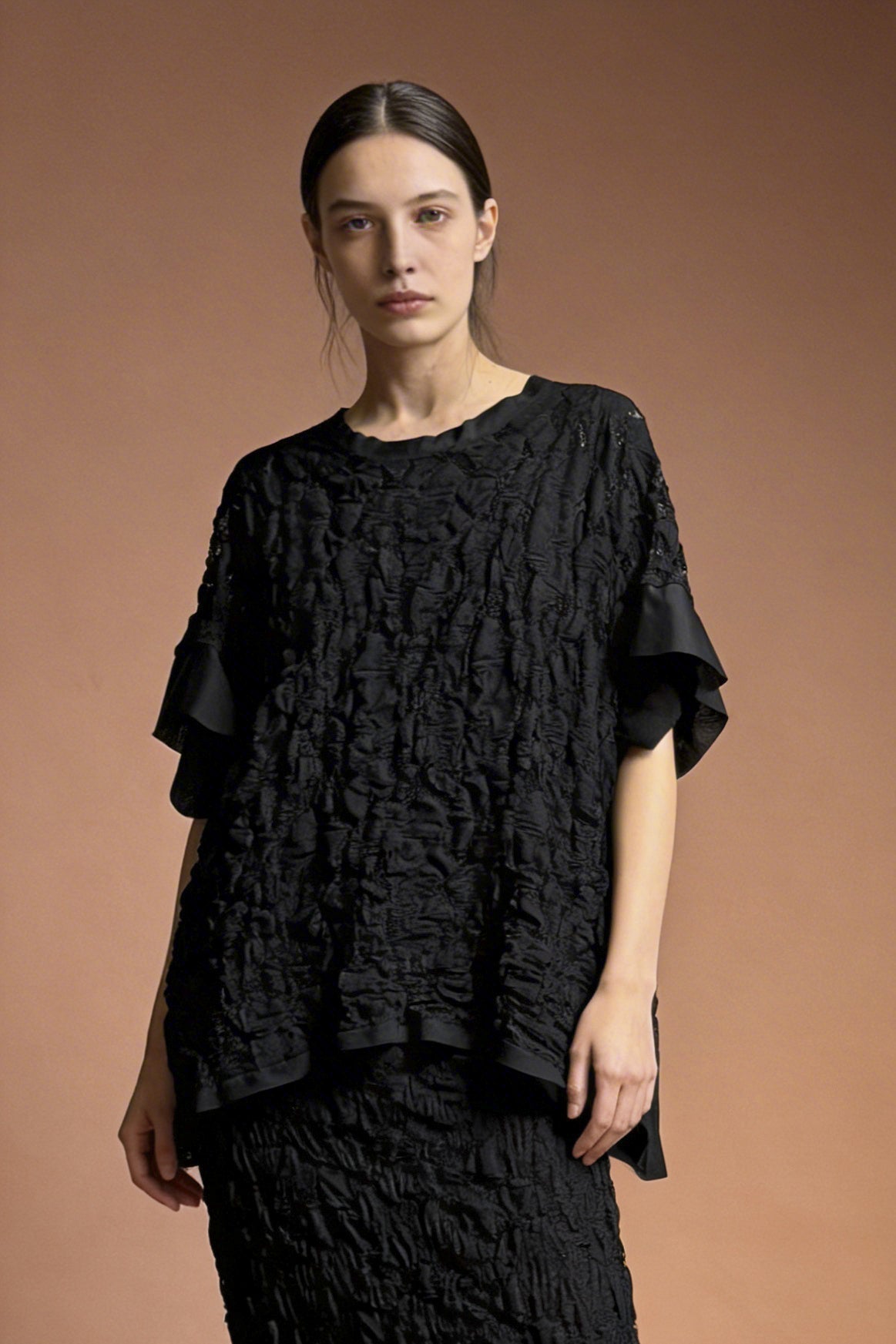 Blusa in pizzo strutturato