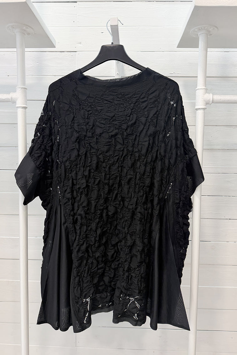 Blusa in pizzo strutturato