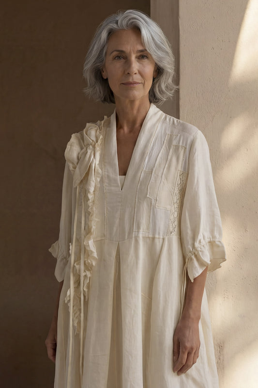 Abito con inserti e pizzo