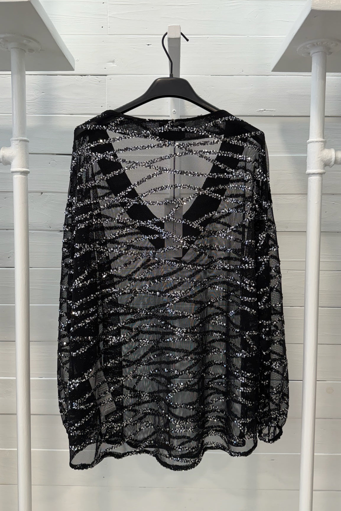 Blusa con paillettes
