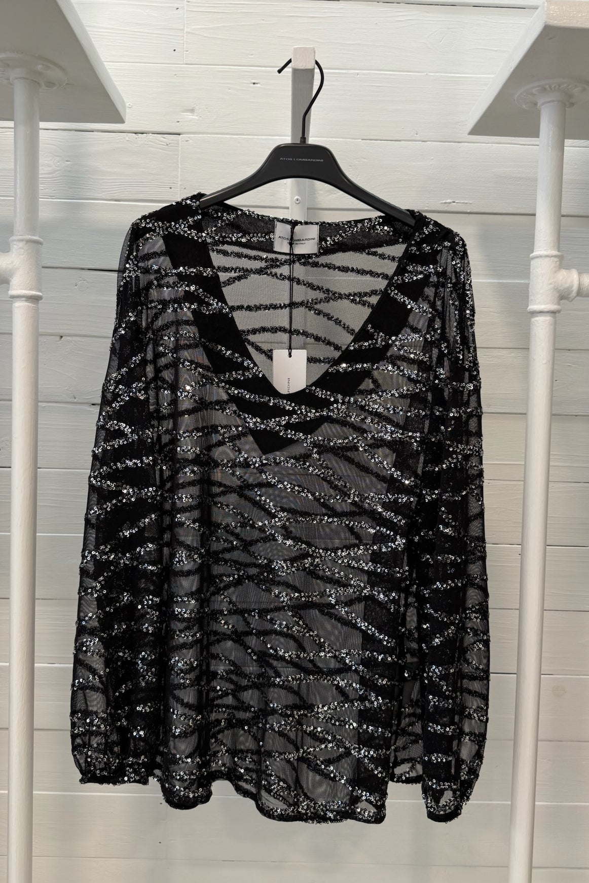 Blusa con paillettes