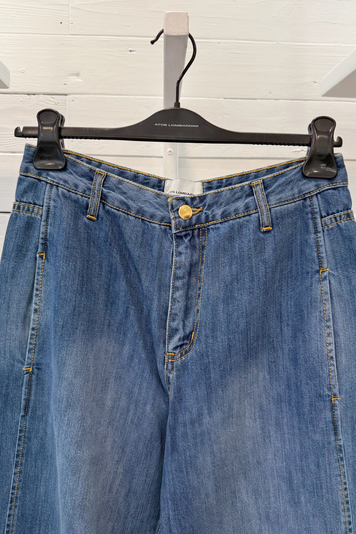 Jeans con tasche a filetto