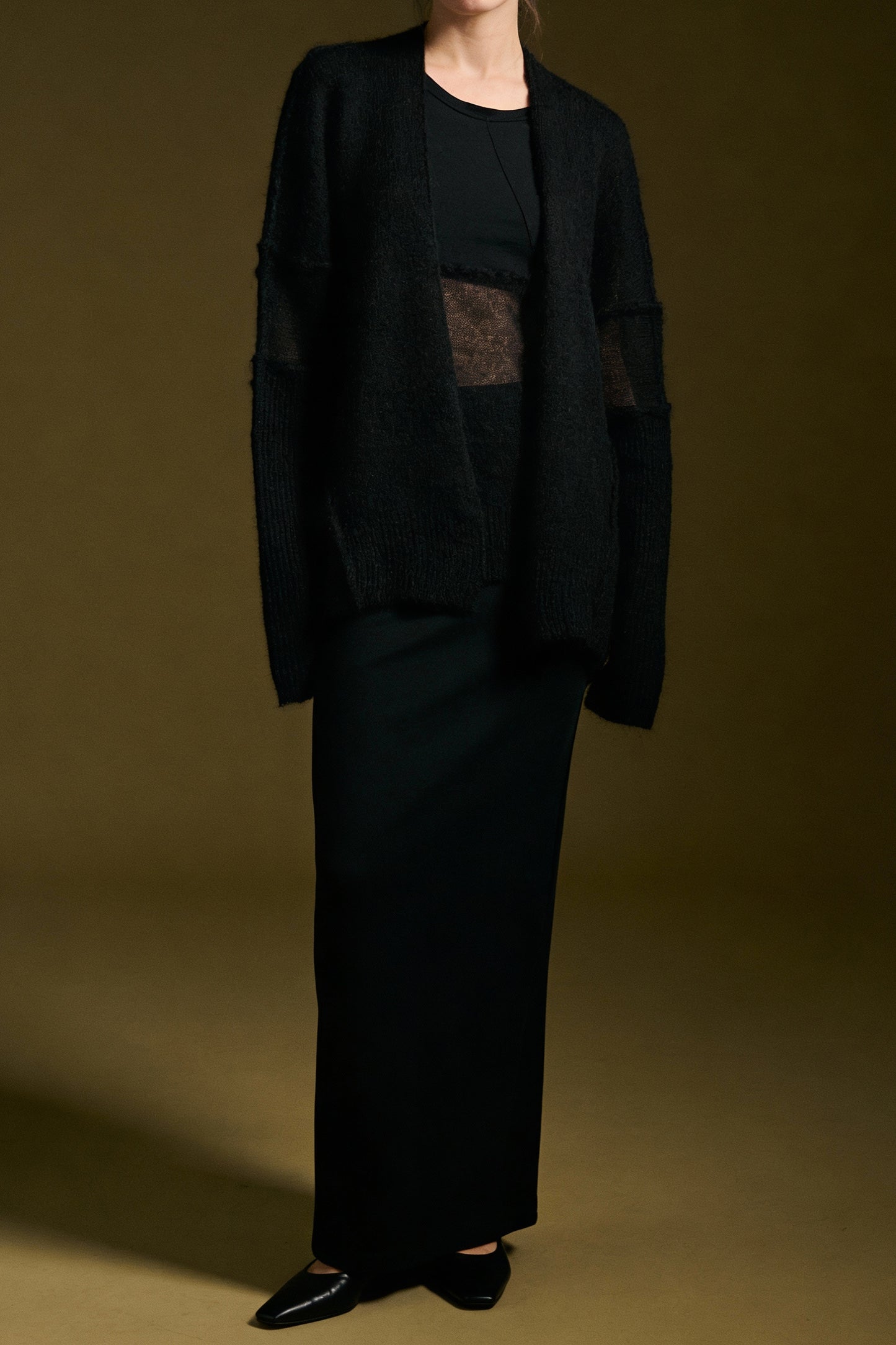 Cardigan aperto velato