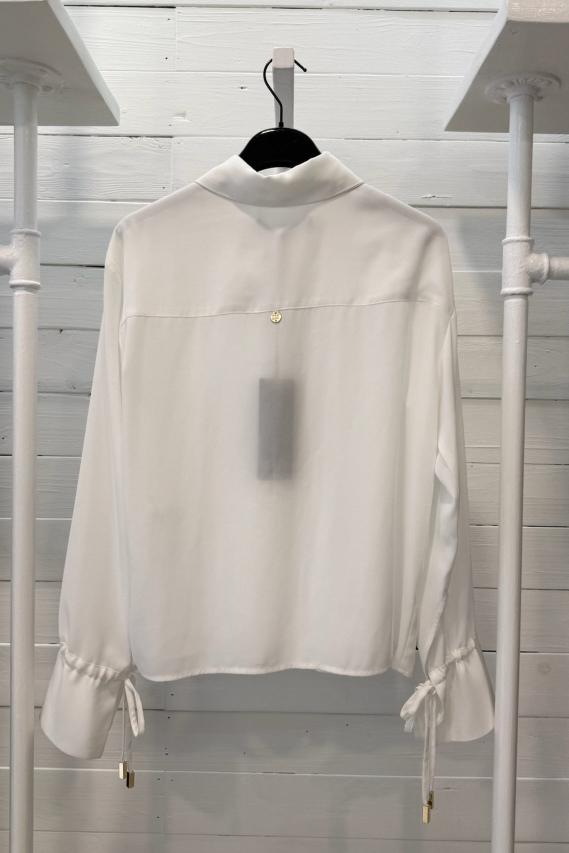 Camicia con bottone gioiello