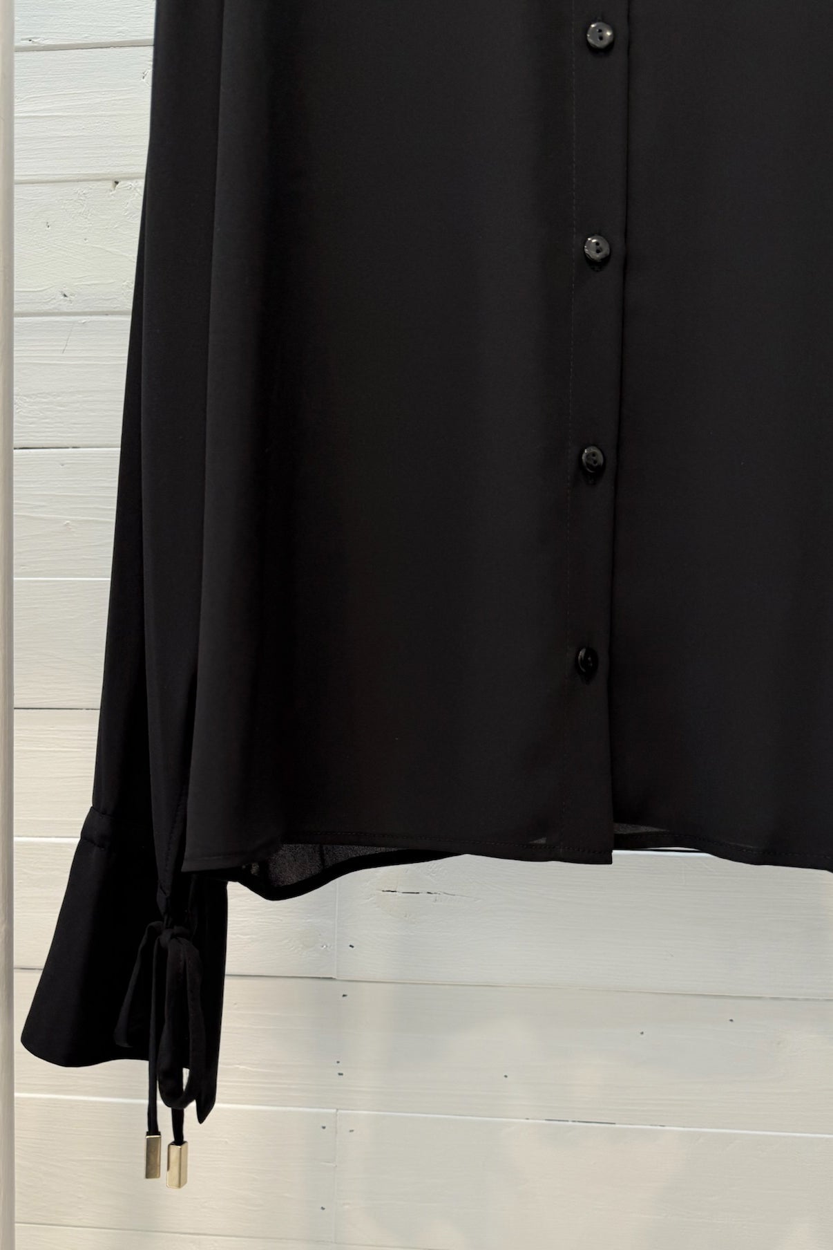 Camicia con bottone gioiello