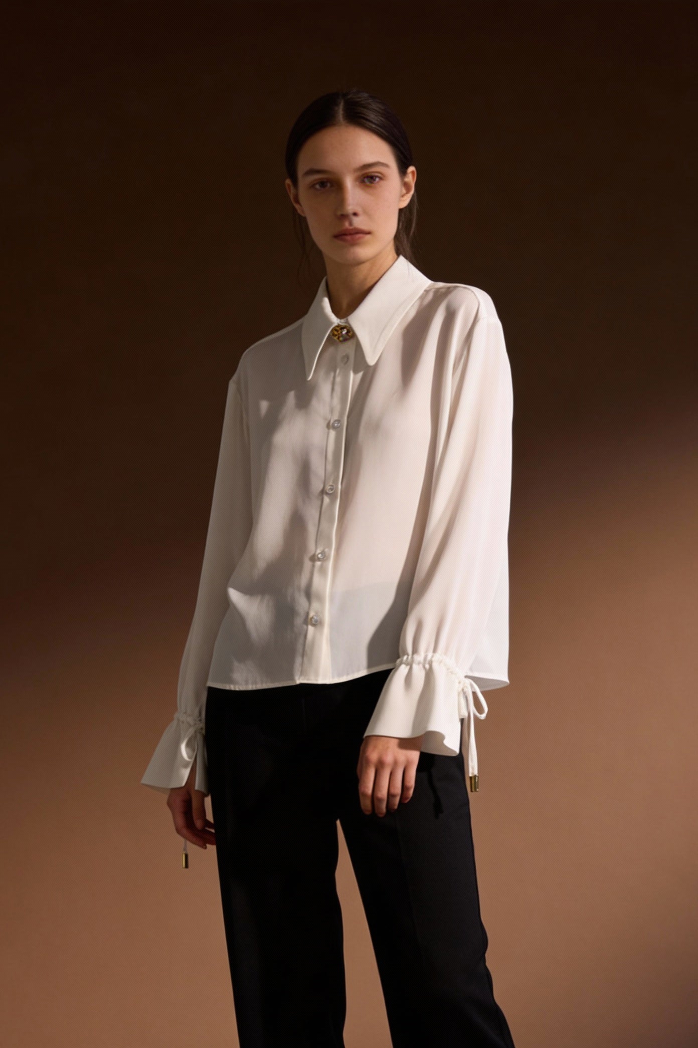 Camicia con bottone gioiello