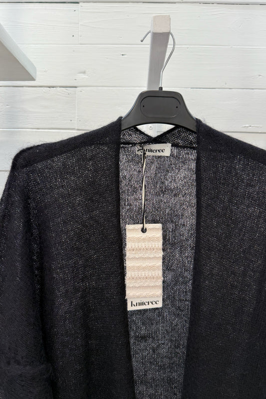 Cardigan aperto velato