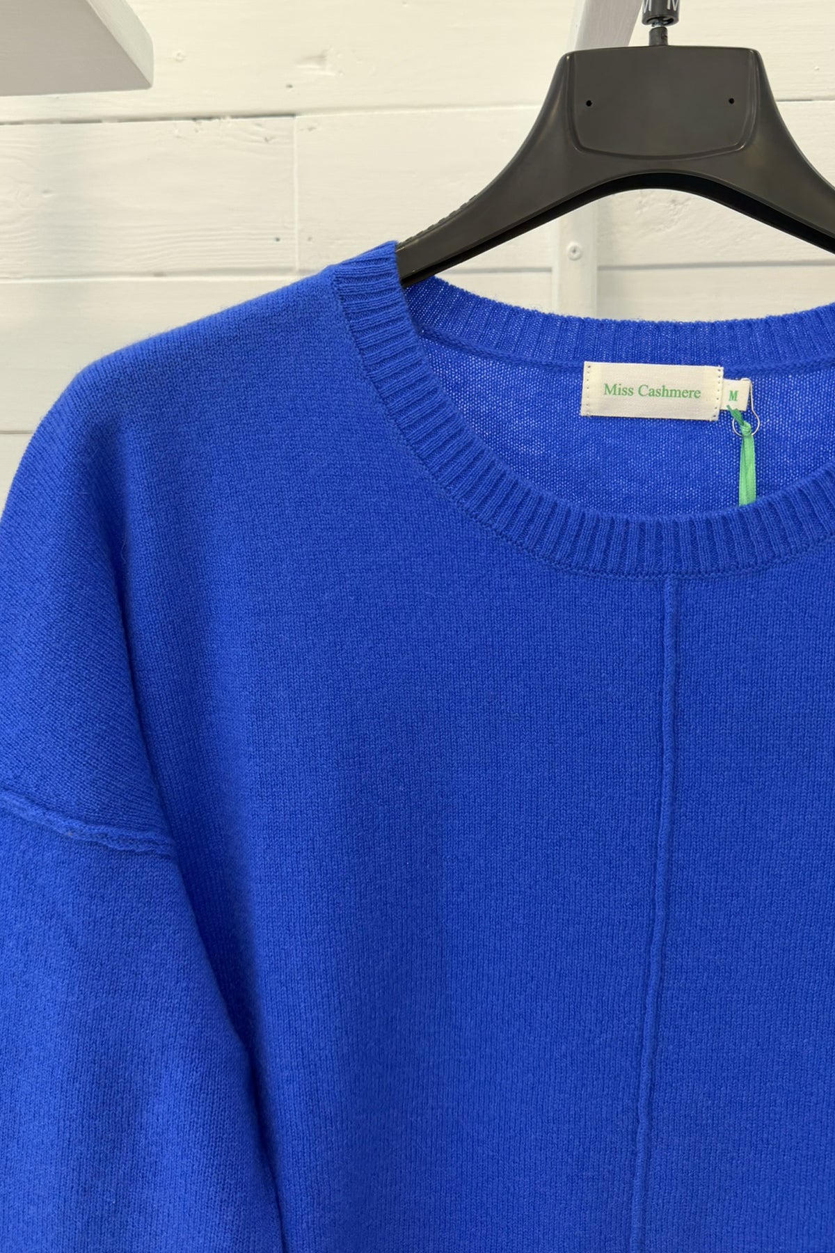 Maglia in puro cashmere con fondo asimmetrico
