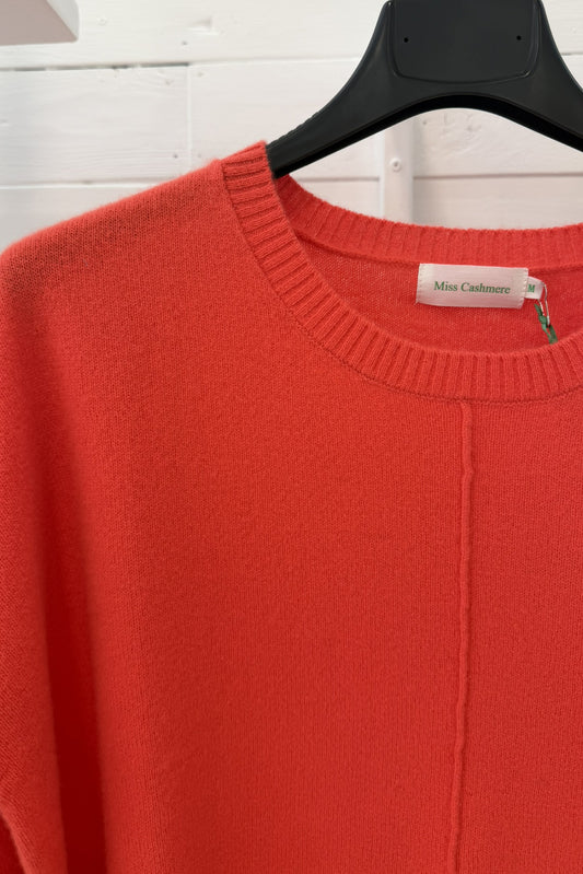 Maglia in puro cashmere con fondo asimmetrico