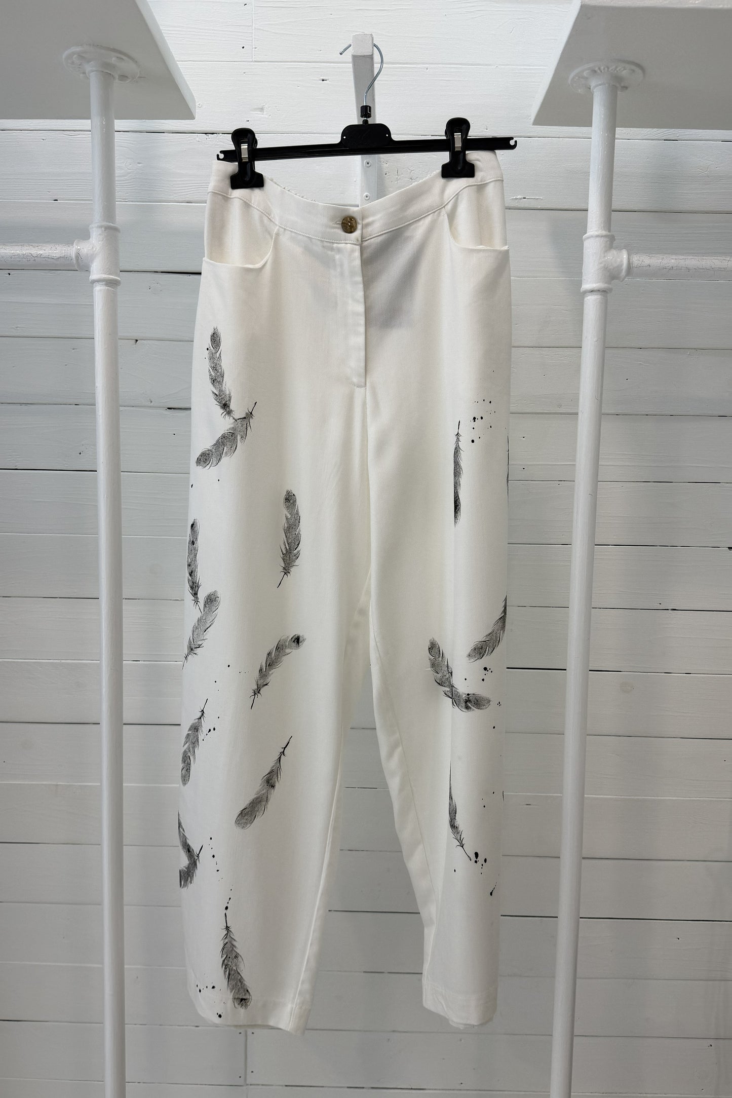 Pantalone stampa piume