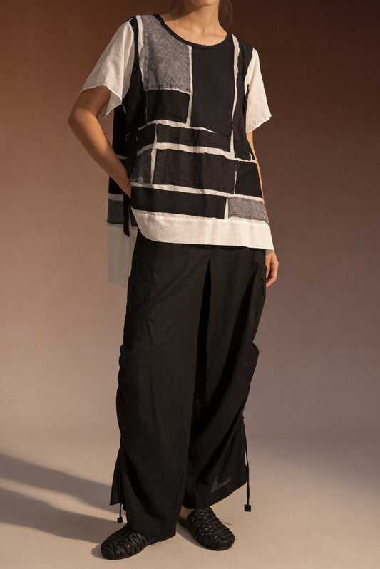 Pantalone ampio in lino con dettagli arricciati