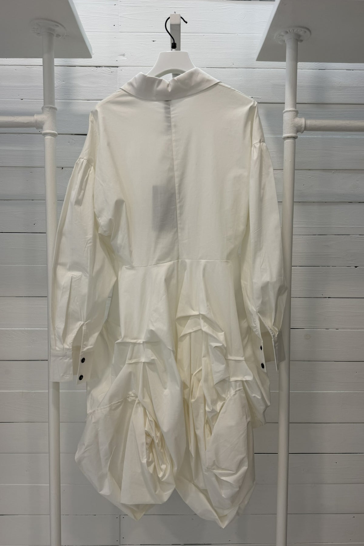 Camicia lunga asimmetrica con fondo drappeggiato