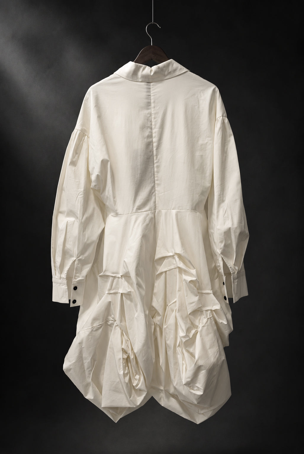 Camicia lunga asimmetrica con fondo drappeggiato