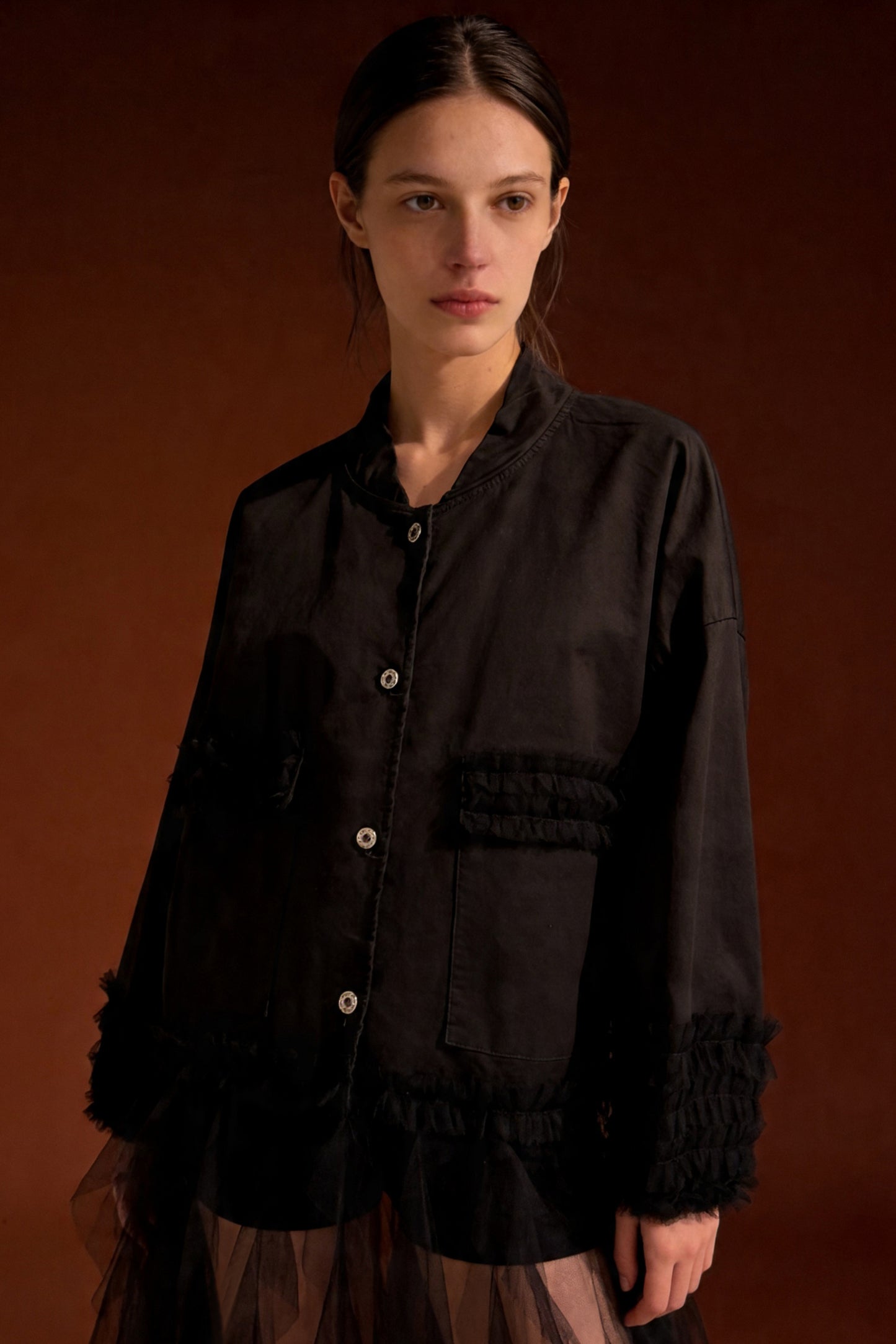 Giacca nera con inserti in tulle