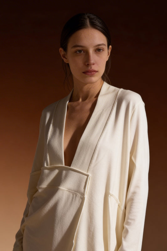 Maglia asimmetrica con inserto geometrico