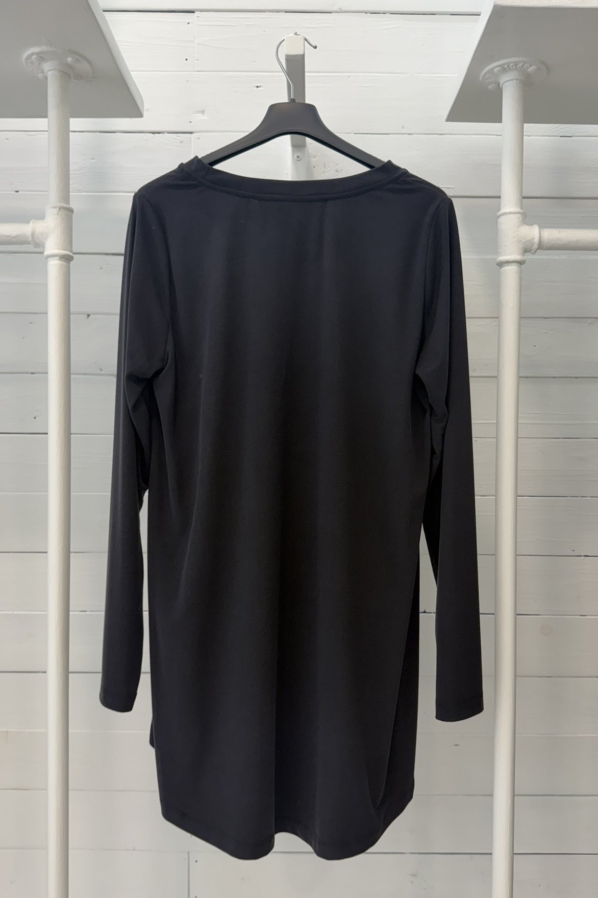 Maglia lunga con fondo asimmetrico