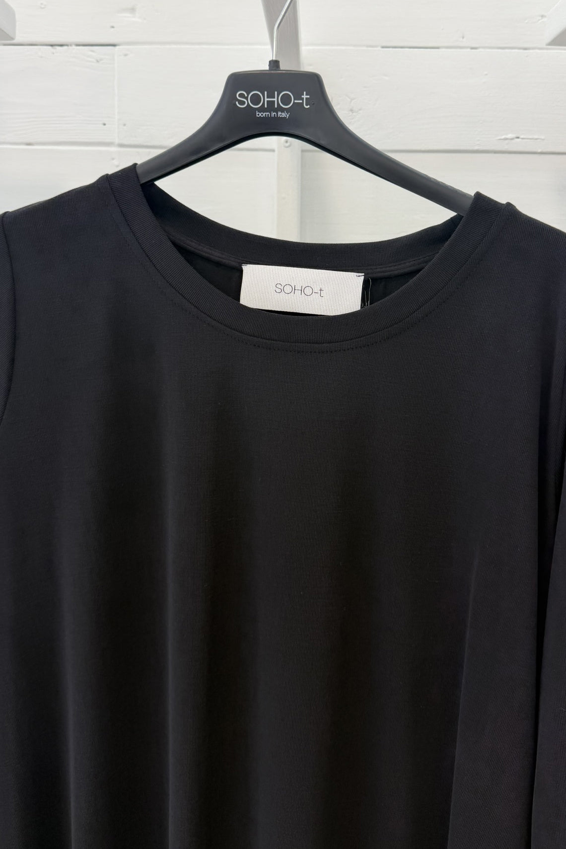 Maglia lunga con fondo asimmetrico
