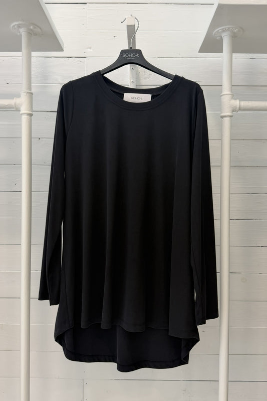 Maglia lunga con fondo asimmetrico