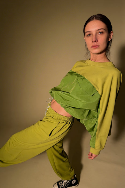 Felpa bicolor con coulisse regolabile