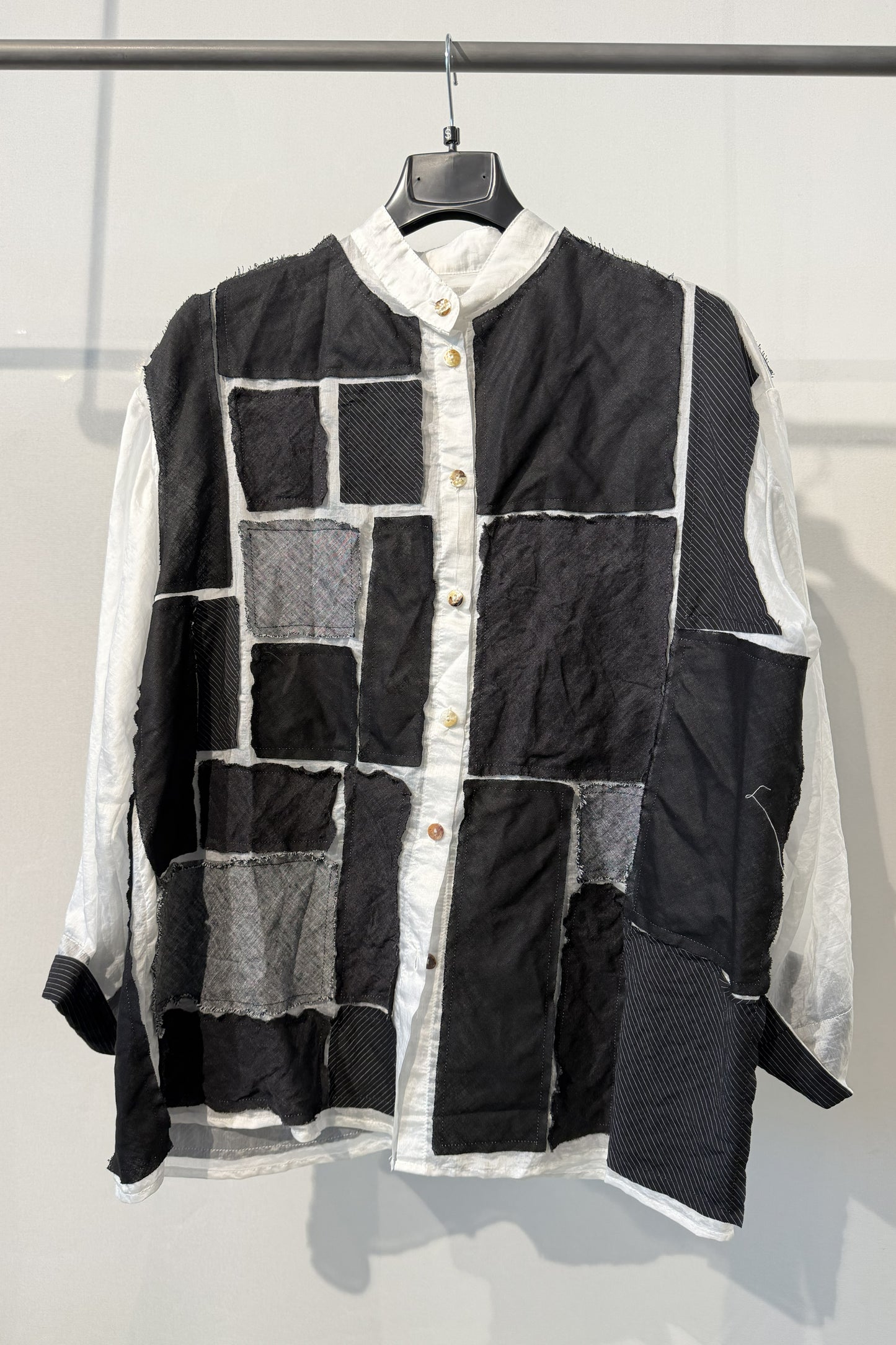 Casacca patchwork over bianco e nero