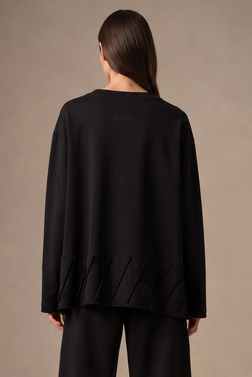 Maglia Ampia con Applicazioni Geometriche