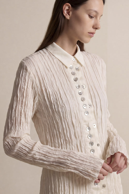 Camicia lunga con bottoni gioiello