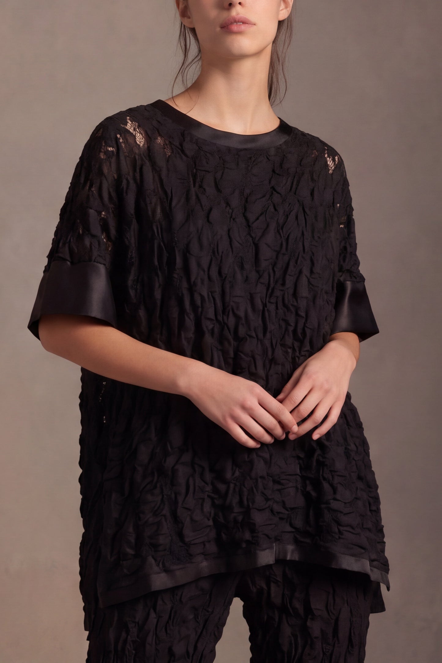 Blusa in pizzo strutturato