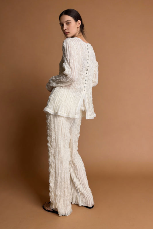 Blusa con bottoni madreperla