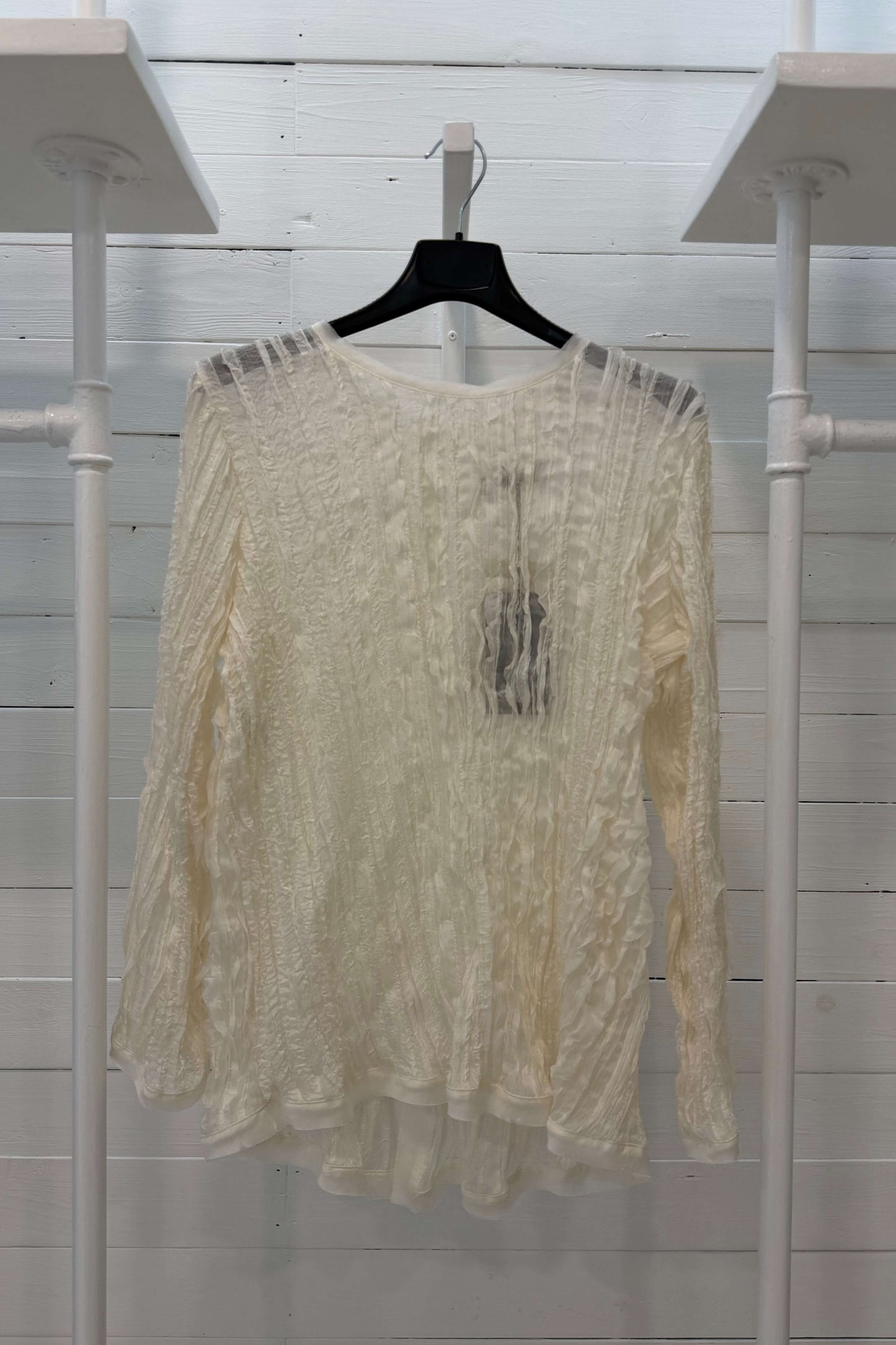 Blusa con bottoni madreperla