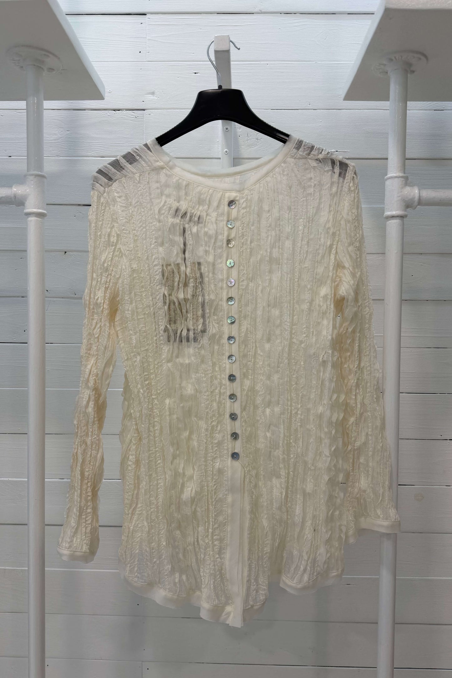 Blusa con bottoni madreperla