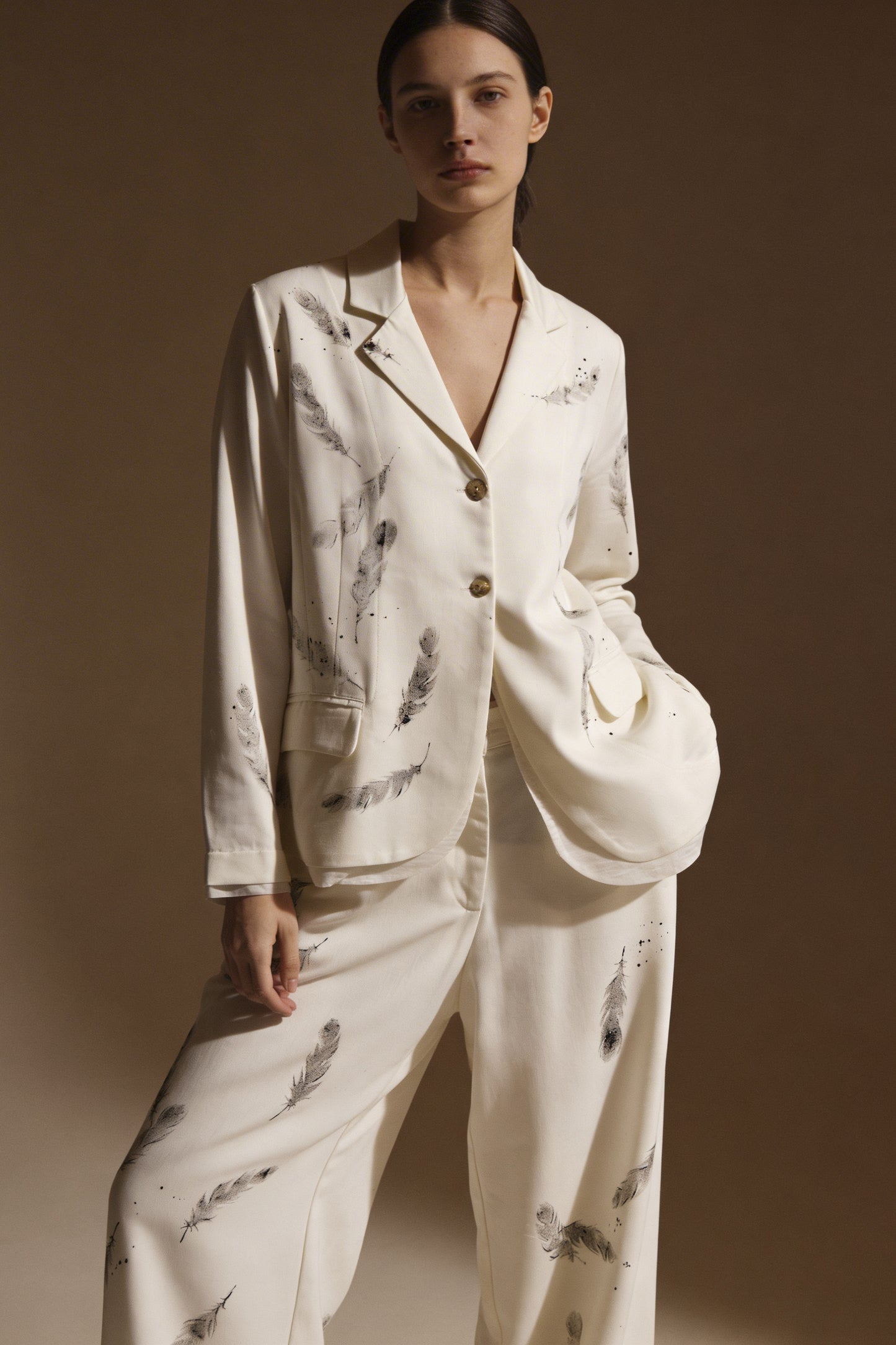 Pantalone stampa piume